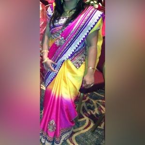 Beautiful chiffon silk saree with multi color border. includes ready made blouse